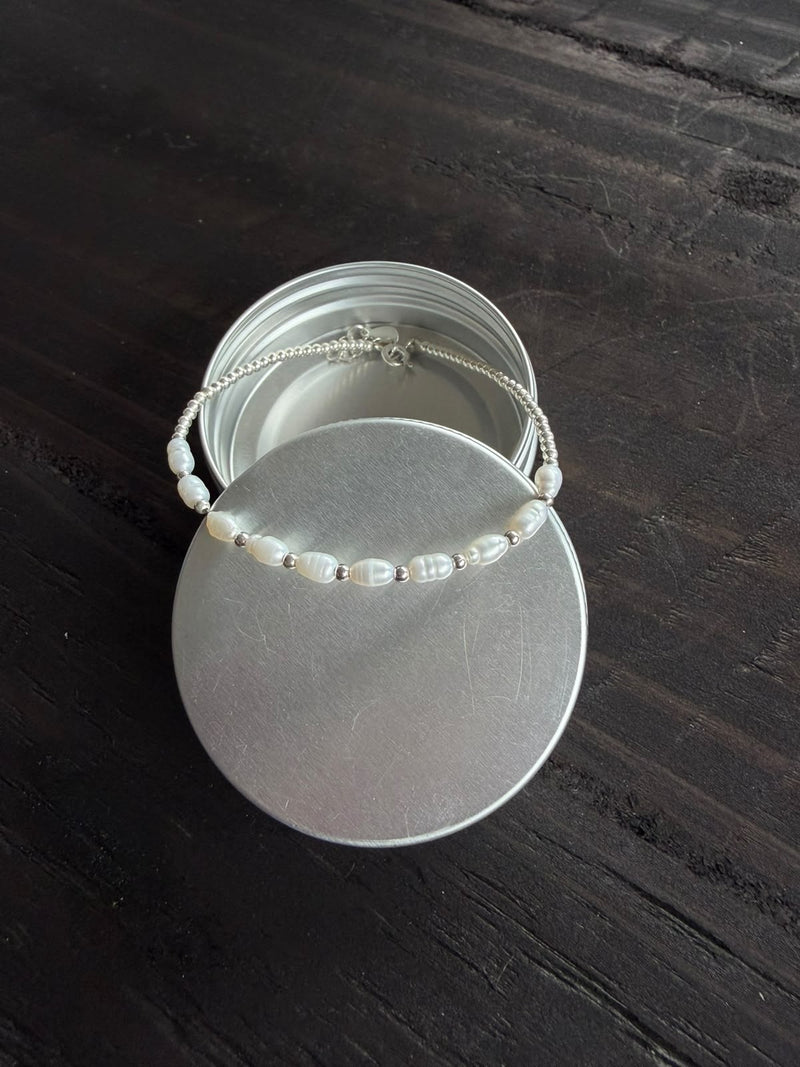 Pulsera perla de río